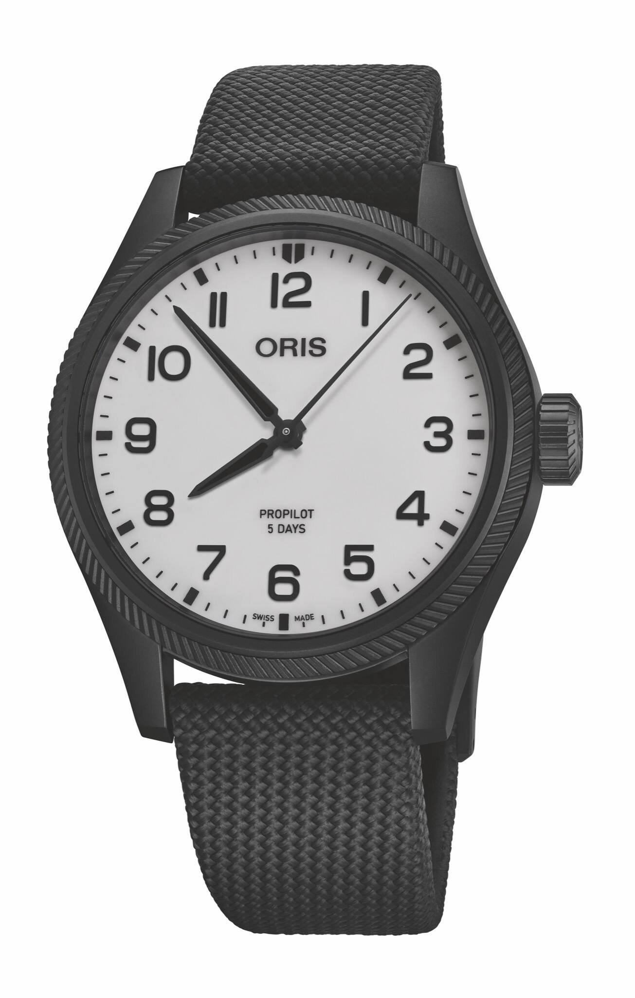ORIS
The Hölstein Edition 2025:
A special no-date ProPilot plated in black DLC with a full-lume dial that plays hide and seek.
The white dial glows green in the dark to reveal the Oris Bear.