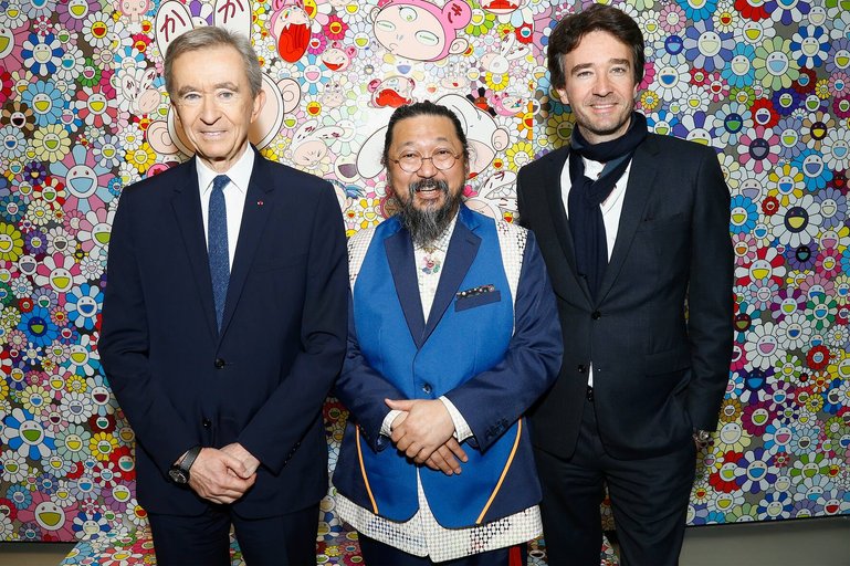 PARIS, FRANCE - APRIL 09:  (L-R) Owner of LVMH Luxury Group and President of the Louis Vuitton Foundation, Bernard Arnault, Japanese Artist Takashi Murakami and General manager of Berluti Antoine Arnault attend "Au Diapason Du Monde" Exhibition at Fondation Louis Vuitton on April 9, 2018 in Paris, France.  (Photo by Julien M. Hekimian/Getty Images)