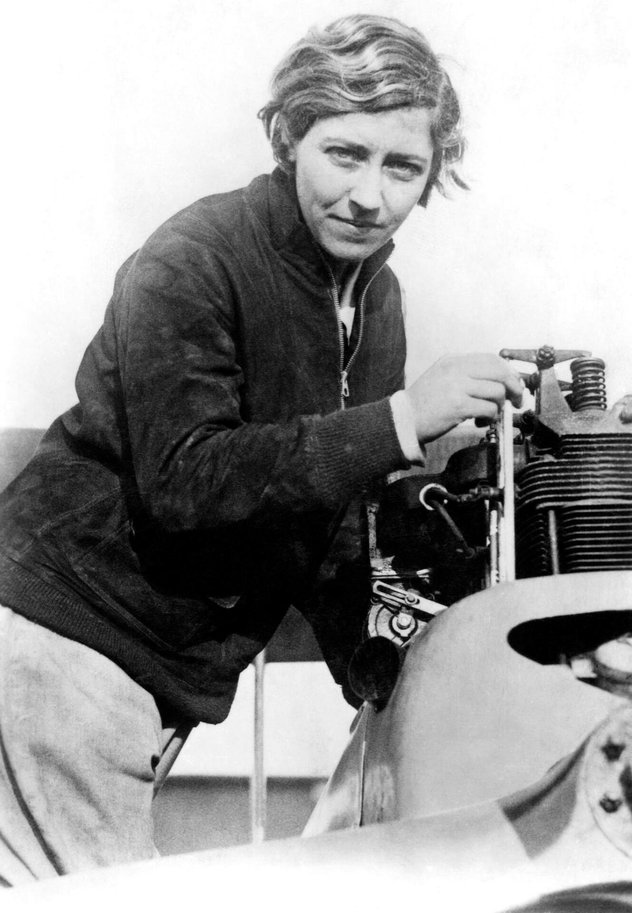 Early Aviation. Circa 1920's. A picture of the aviator Amy Johnson, C.B.E. working on the engine of a plane. Remembered mostly for her long distance solo flights, in 1931 she flew to Japan, via moscow, and back and in 1932 flew to Cpe town and back solo.