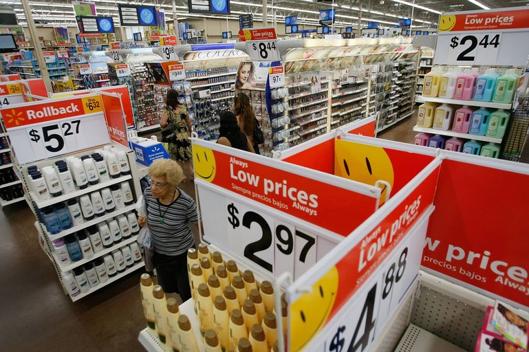NORTH MIAMI, FL - AUGUST 14:  People shop at a Wal-Mart Store August 14, 2008 in North Miami, Florida. The company reported its second-quarter profit rose 17% and it raised its full-year forecast.  (Photo by Joe Raedle/Getty Images)