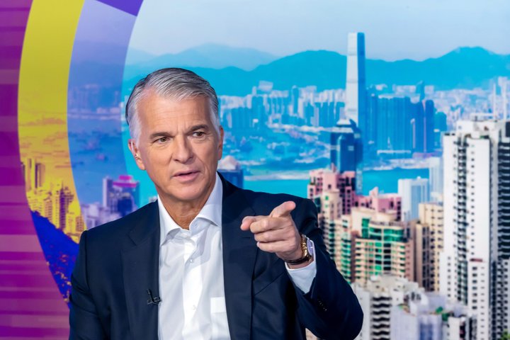 Sergio Ermotti, chief executive officer of UBS Group AG, during a Bloomberg Television interview in Hong Kong, China, on Thursday, Sept. 11, 2025. Ermotti said the impact of global tariffs on the US economy and Federal Reserve monetary policy remains unclear. Photographer: Paul Yeung/Bloomberg via Getty Images