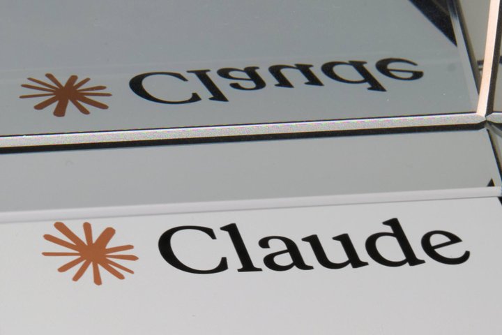 Artificial Intelligence App Icons On Smartphone Screens Photo Illustrations The Claude logo and wordmark, with its reflection, are seen on a mirrored surface in this illustration photo taken in San Ferdinando di Puglia, Italy, on October 6, 2026. Claude is an artificial intelligence assistant developed by Anthropic. San Ferdinando di Puglia BT Italy PUBLICATIONxNOTxINxFRA Copyright: xMatteoxDellaxTorrex originalFilename: dellatorre-notitle261006_npXhI.jpg