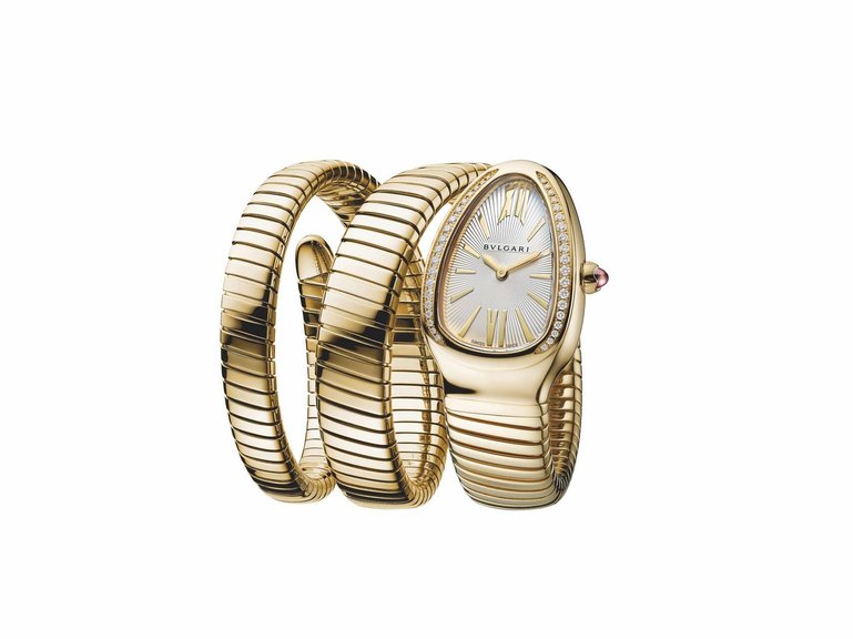 Die Serpenti Tubogas Uhr in Gold mit Diamanten.