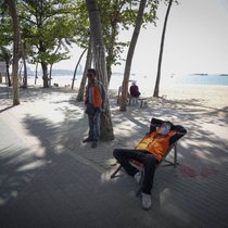 Keine Touristen in Thailand: Taxifahrer warten auf Kundschaft.