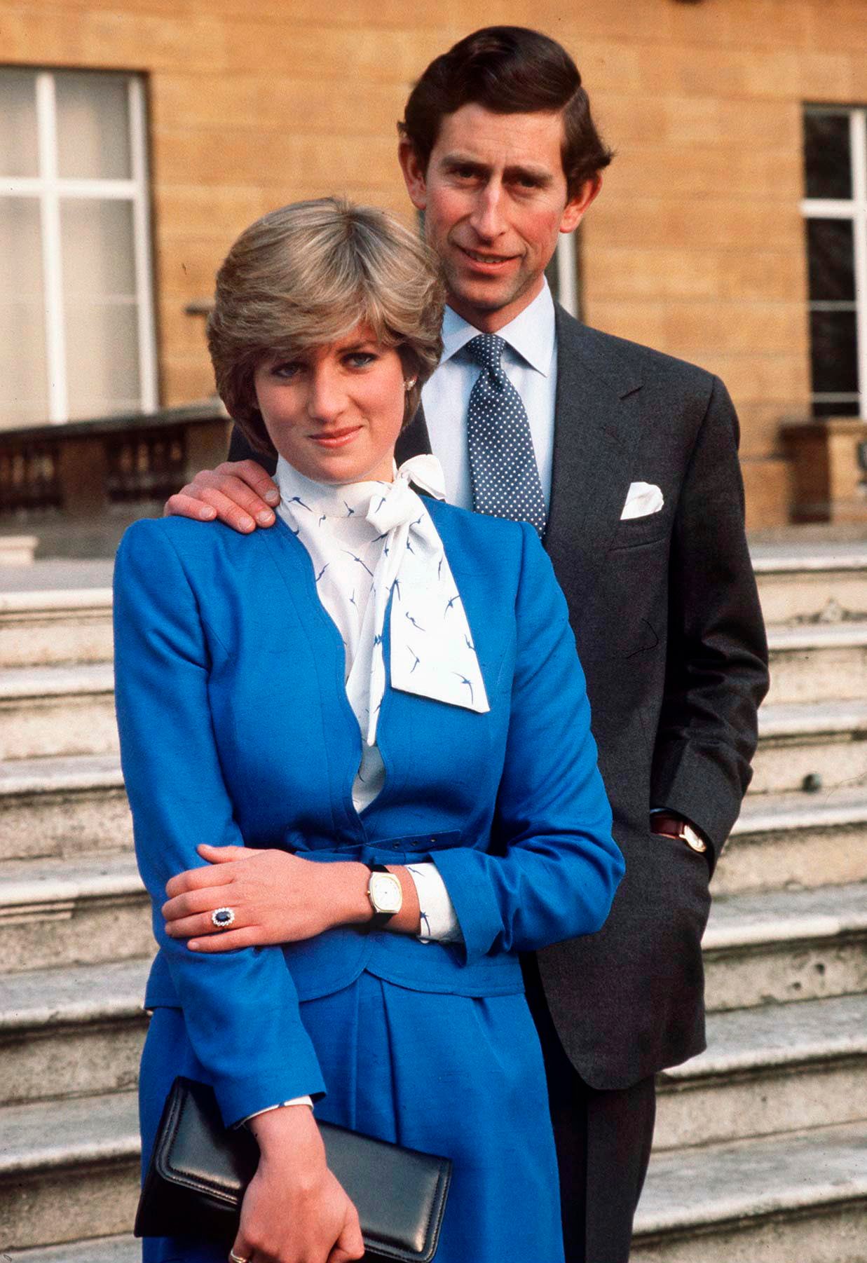 LONDON, UNITED KINGDOM - FEBRUARY 24:  Lady Diana Spencer Reveals Her Sapphire And Diamond Engagement Ring While She And Prince Charles Pose For Photographs In The Grounds Of Buckingham Palace Following The Announcement Of Their Engagement.  (Photo by Tim Graham Photo Library via Getty Images)