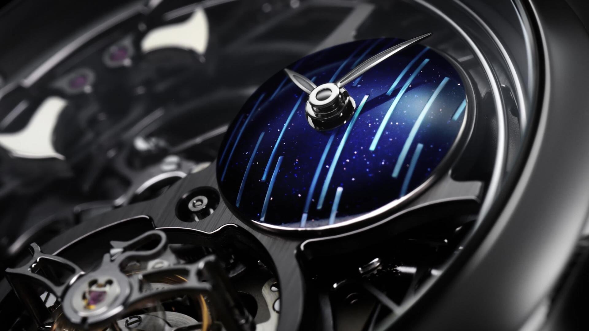 In der Endeavour-Minutenrepetition «Cosmic Rain» kombiniert H. Moser & Cie. ein Aventurin-Zifferblatt mit gewölbten Perlmutt-Streifen.