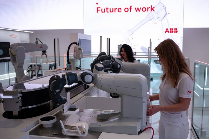 epa07476442 A robot at the fair stand of the company 'ABB' at the Hannover Industry Fair (Hannover Messe) in Hanover, Germany, 31 March 2019. From 01 April to 05 April, 6,500 exhibitors from 75 countries show their products during one of the World's leading fairs for industrial goods. Main focus of the Hannover Messe 2019 is on Artificial Intelligence and the new mobile standard 5G. EPA/JENS SCHLUETER
