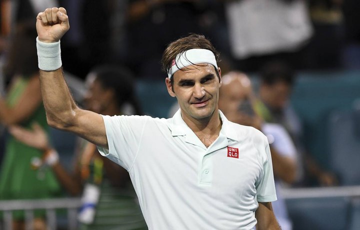 Roger Federer, of Switzerland, celebrates his 6-2, 6-4 win over Denis Shapovalov, of Canada, during the semifinals of the Miami Open tennis tournament Friday, March 29, 2019, in Miami Gardens, Fla. (AP Photo/Jim Rassol)