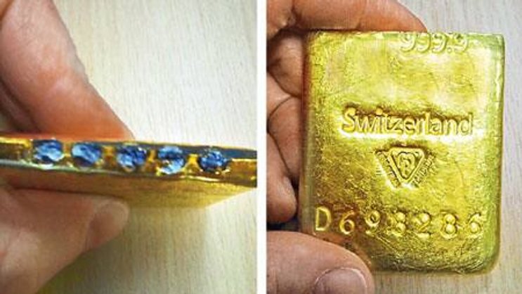 Aussen Gold, innen Wolfram: gefälschte Goldbarren.