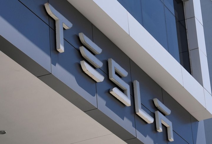 FILE - The Tesla logo is displayed at a Tesla dealership Thursday, Mar. 13, 2025, in Miami. (AP Photo/Lynne Sladky, file)
FILE - The Tesla logo is displayed at a Tesla dealership Thursday, Mar. 13, 2025, in Miami. (AP Photo/Lynne Sladky, file) Tesla Roadster