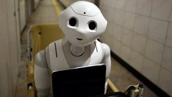 Roboter: Übernehmen immer mehr Routineaufgaben für Analysten. Keystone